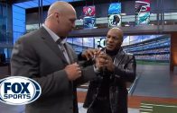 Mike Tyson gives Brian Urlacher boxing lessons